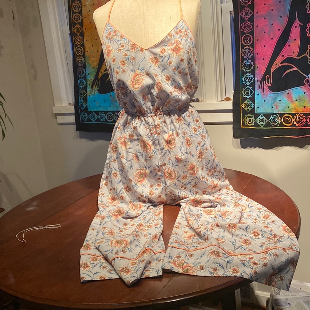 Floral romper with tie.